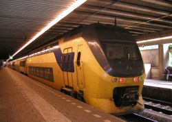 Train leaving from 'Den Haag Centraal' Station